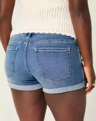 Curvy Low-Rise Medium Wash Denim Shortie Shorts