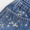 High-Rise Medium Wash Floral Embroidered A-Line Denim Shorts