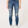 High-Rise Ripped Medium Wash Super Skinny Jeans