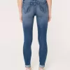 High-Rise Ripped Medium Wash Super Skinny Jeans