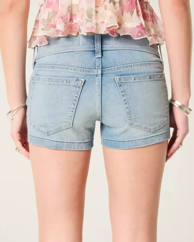 Low-Rise Medium Wash Studded Denim Shortie Shorts
