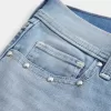 Low-Rise Medium Wash Studded Denim Shortie Shorts