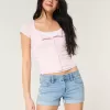 Low-Rise Ripped Light Wash Denim Shortie Shorts