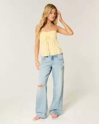 Low-Rise Ripped Light Wash Graphic Baggy Jeans