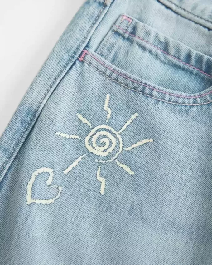 Low-Rise Ripped Light Wash Graphic Baggy Jeans