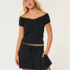 Mid-Rise Pleated Mini Skort