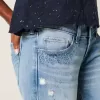 Ultra Low-Rise Distressed Light Wash Sequin Flare Jeans