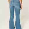 Ultra Low-Rise Medium Wash Flare Jeans